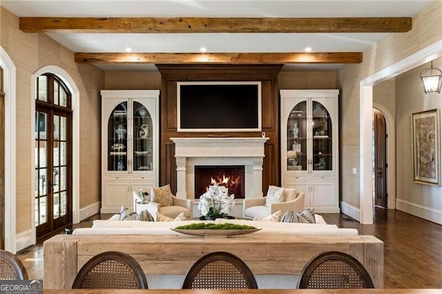 sitting room featuring dark hardwood / wood-style floors and french doors