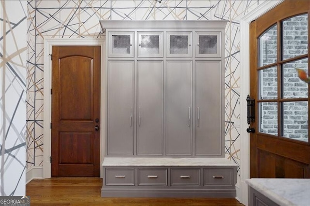 mudroom with hardwood / wood-style floors