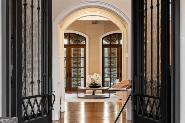 foyer with wood-type flooring