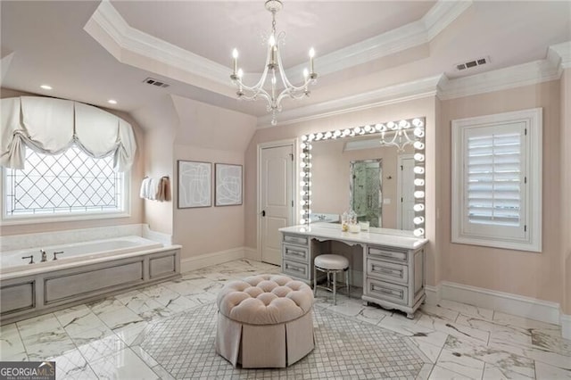 bathroom with a tub to relax in, crown molding, and a raised ceiling