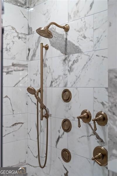 room details with a tile shower