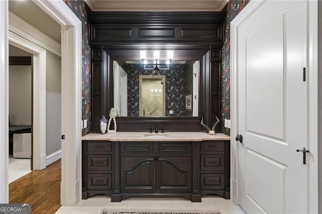 bathroom featuring vanity and hardwood / wood-style flooring