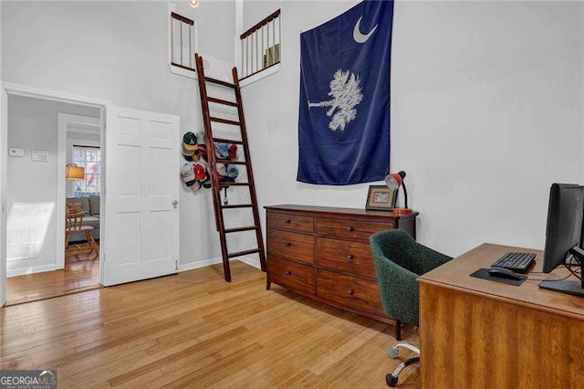 office space with hardwood / wood-style floors