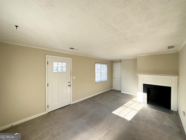 unfurnished living room featuring a textured ceiling, carpet floors, and crown molding