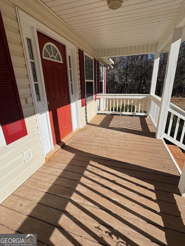 deck featuring covered porch