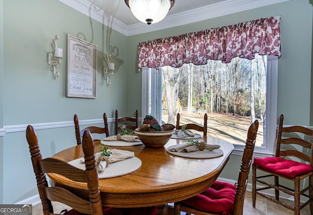 dining room with ornamental molding