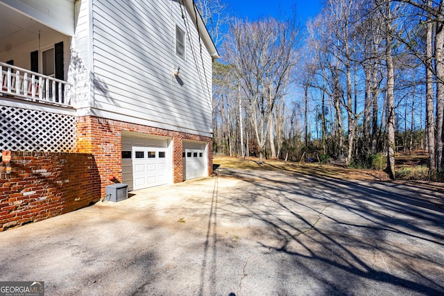 view of property exterior featuring a garage