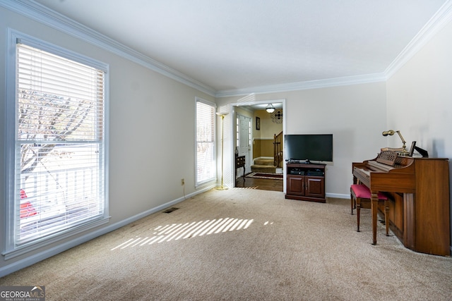 carpeted living room featuring crown molding