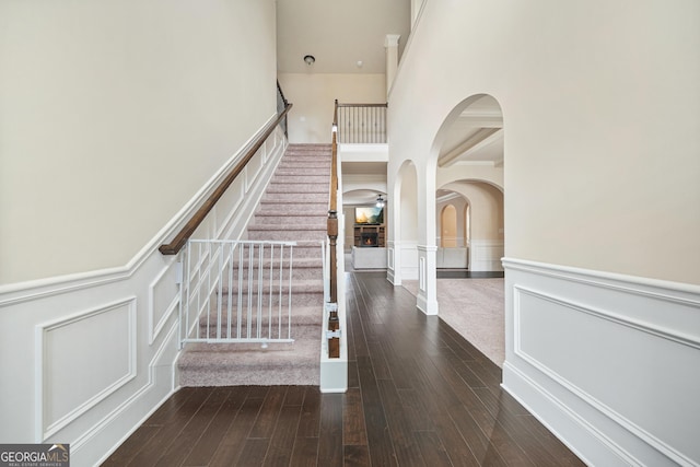 staircase featuring hardwood / wood-style floors