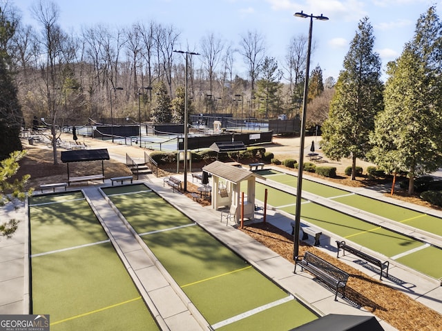 surrounding community featuring tennis court