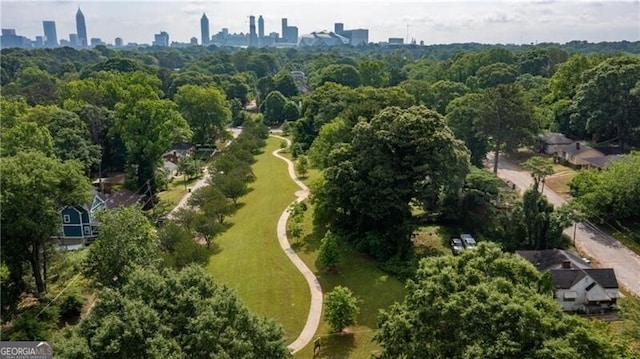 birds eye view of property with a city view