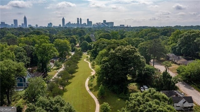 birds eye view of property with a view of city