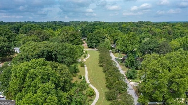 aerial view featuring a view of trees