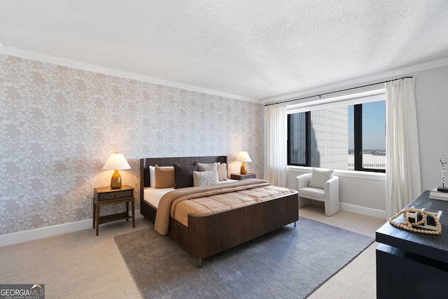 carpeted bedroom with wallpapered walls, baseboards, and a textured ceiling