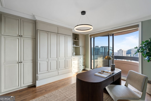 office space with a view of city and wood finished floors