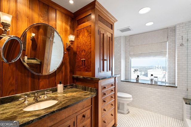 bathroom featuring toilet, recessed lighting, visible vents, vanity, and tile patterned floors