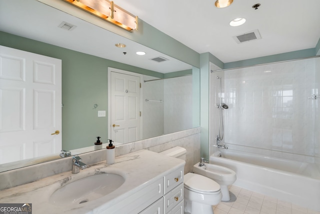 full bath with visible vents, toilet, a bidet, and shower / tub combination