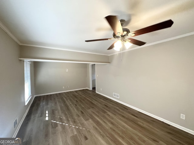 unfurnished room with ceiling fan, dark hardwood / wood-style floors, and ornamental molding