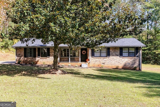 single story home with a front yard and a porch