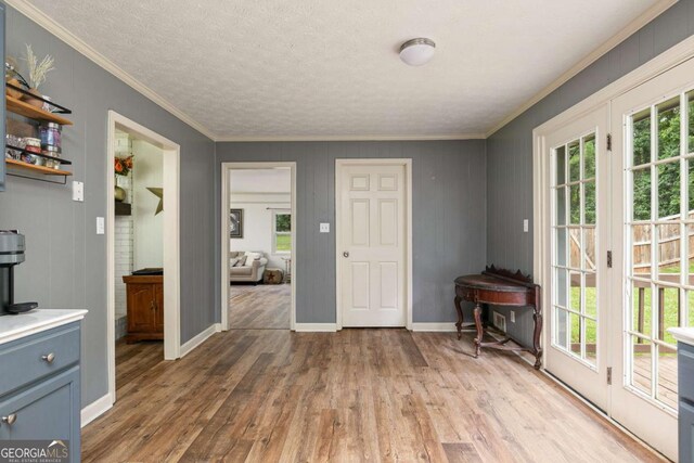 bathroom featuring vanity, toilet, a textured ceiling, and wood-type flooring