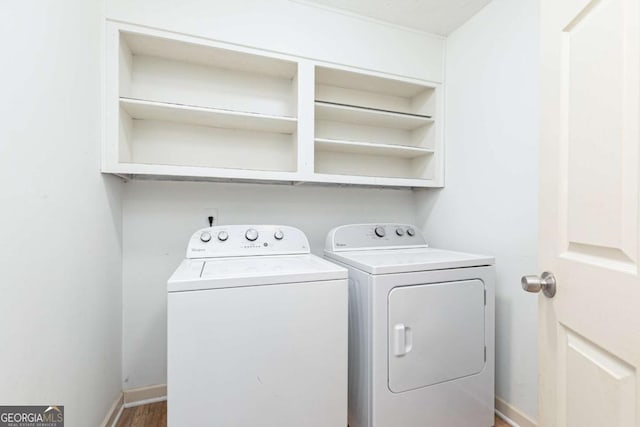 laundry room with washing machine and dryer