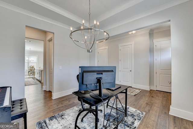 office area featuring hardwood / wood-style floors, crown molding, and a chandelier