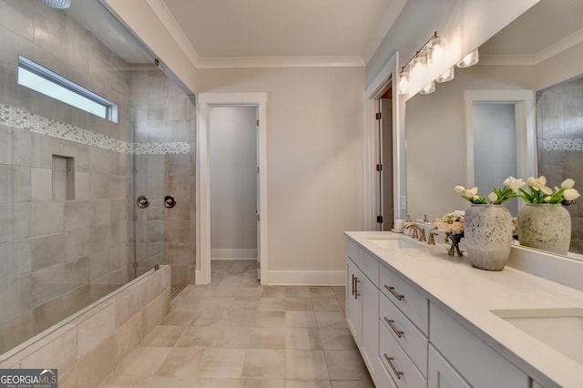 bathroom featuring tiled shower, vanity, and ornamental molding