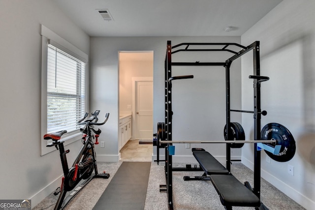 workout area featuring a healthy amount of sunlight