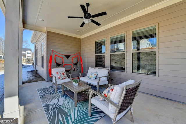 view of patio featuring an outdoor living space and ceiling fan