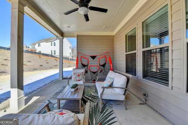 view of patio with ceiling fan