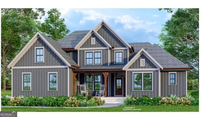 view of front of property with roof with shingles, a porch, and board and batten siding