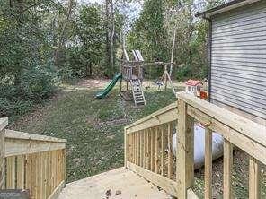 exterior space featuring a playground