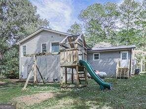 view of jungle gym with a yard