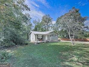 view of front of home with a front yard