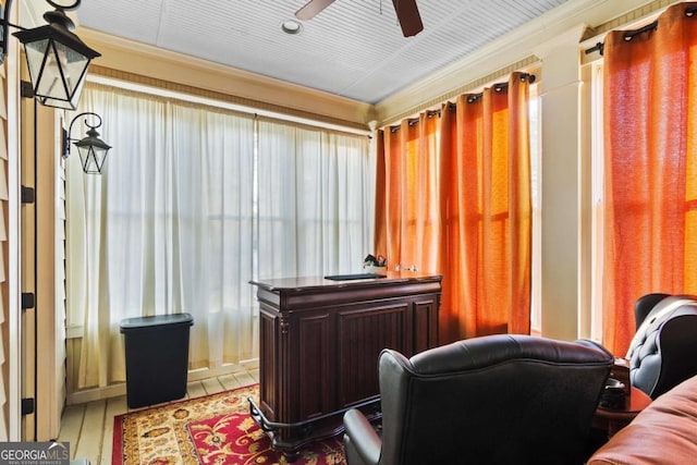 interior space featuring ceiling fan