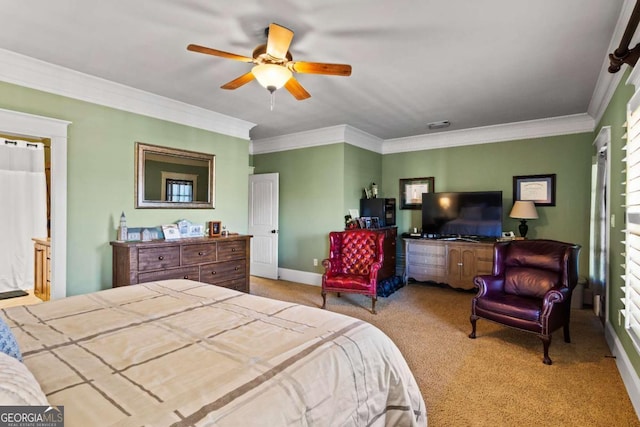 bedroom with ceiling fan, crown molding, and light carpet