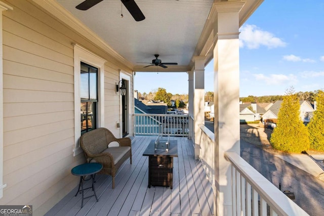 balcony featuring ceiling fan