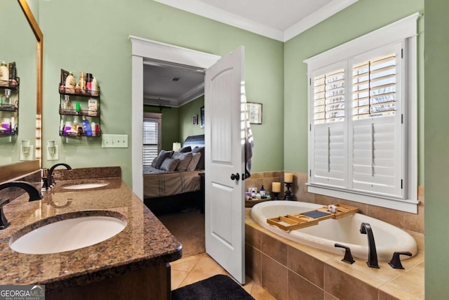 bathroom with tiled bath, vanity, tile patterned floors, and ornamental molding