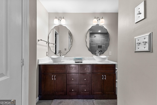 bathroom featuring tile patterned floors and vanity