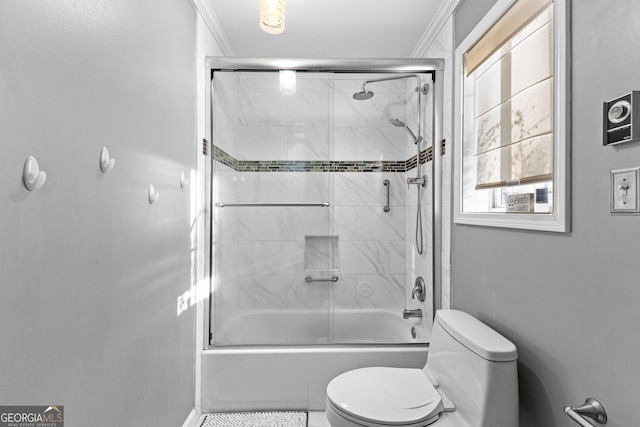 bathroom with tile patterned floors, bath / shower combo with glass door, toilet, and ornamental molding