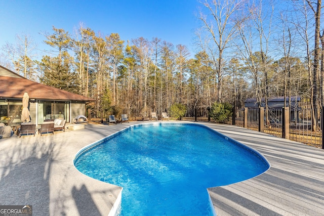 view of pool featuring a patio area