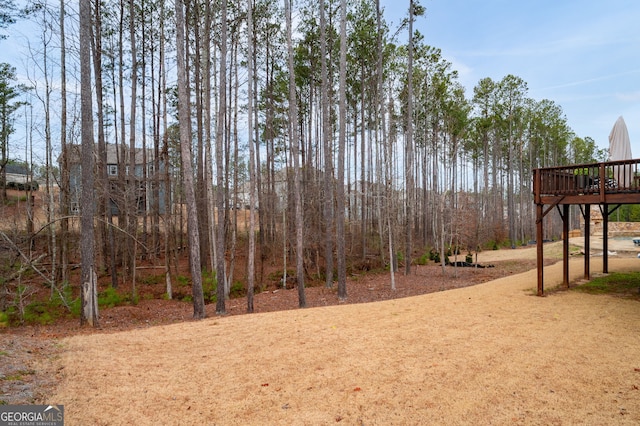 view of yard featuring a deck