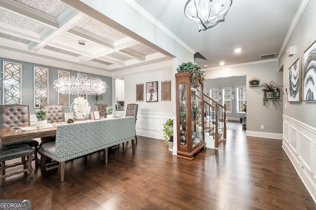 dining area featuring beamed ceiling, coffered ceiling, a chandelier, and dark hardwood / wood-style floors