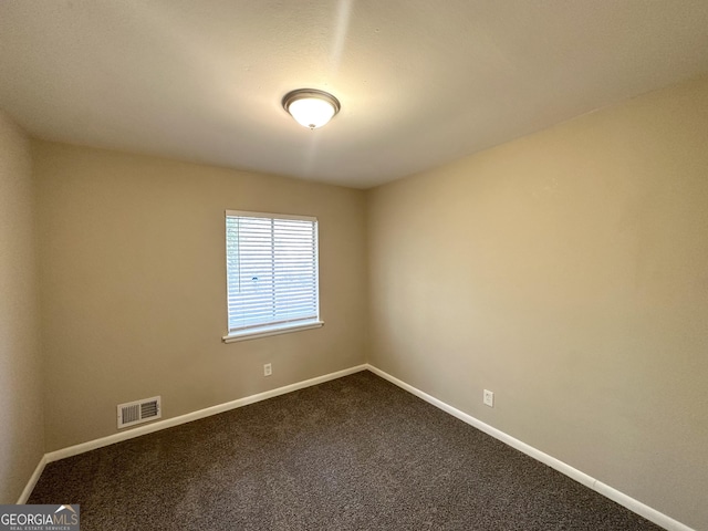 spare room with carpet flooring