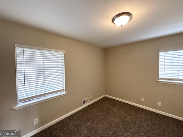 view of carpeted spare room