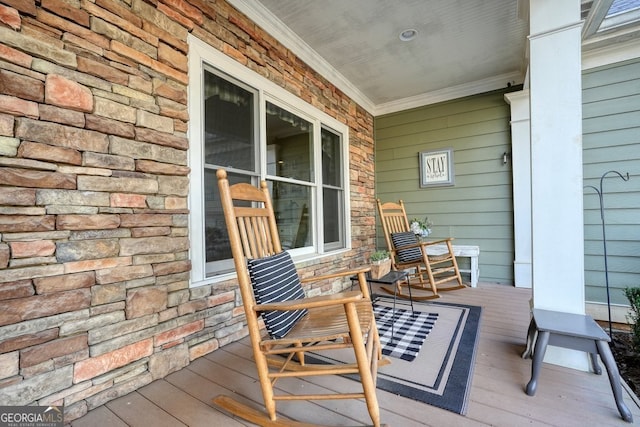 wooden terrace with covered porch