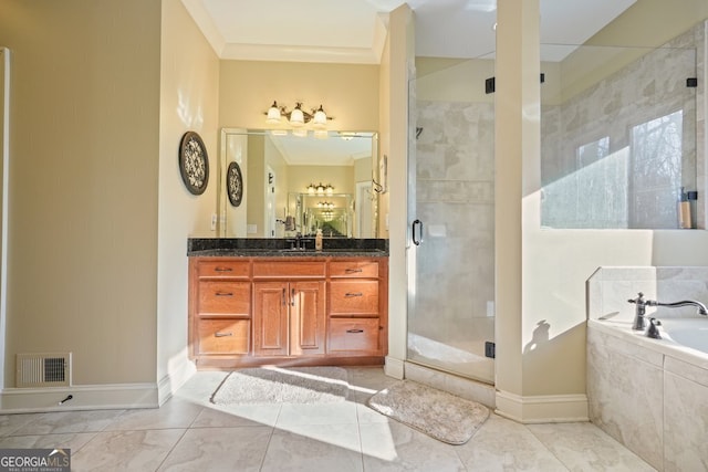 bathroom featuring crown molding, separate shower and tub, tile patterned floors, and vanity