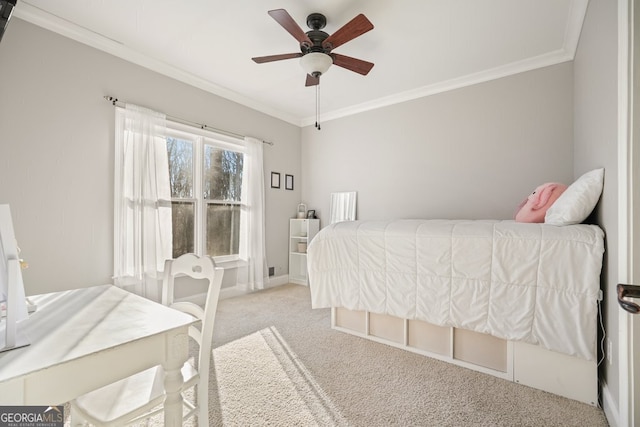 carpeted bedroom featuring crown molding and ceiling fan