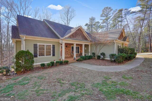 view of front of property featuring covered porch