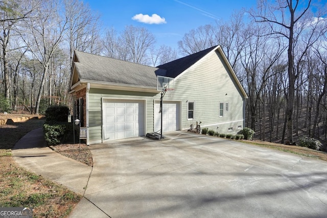 view of property exterior featuring a garage